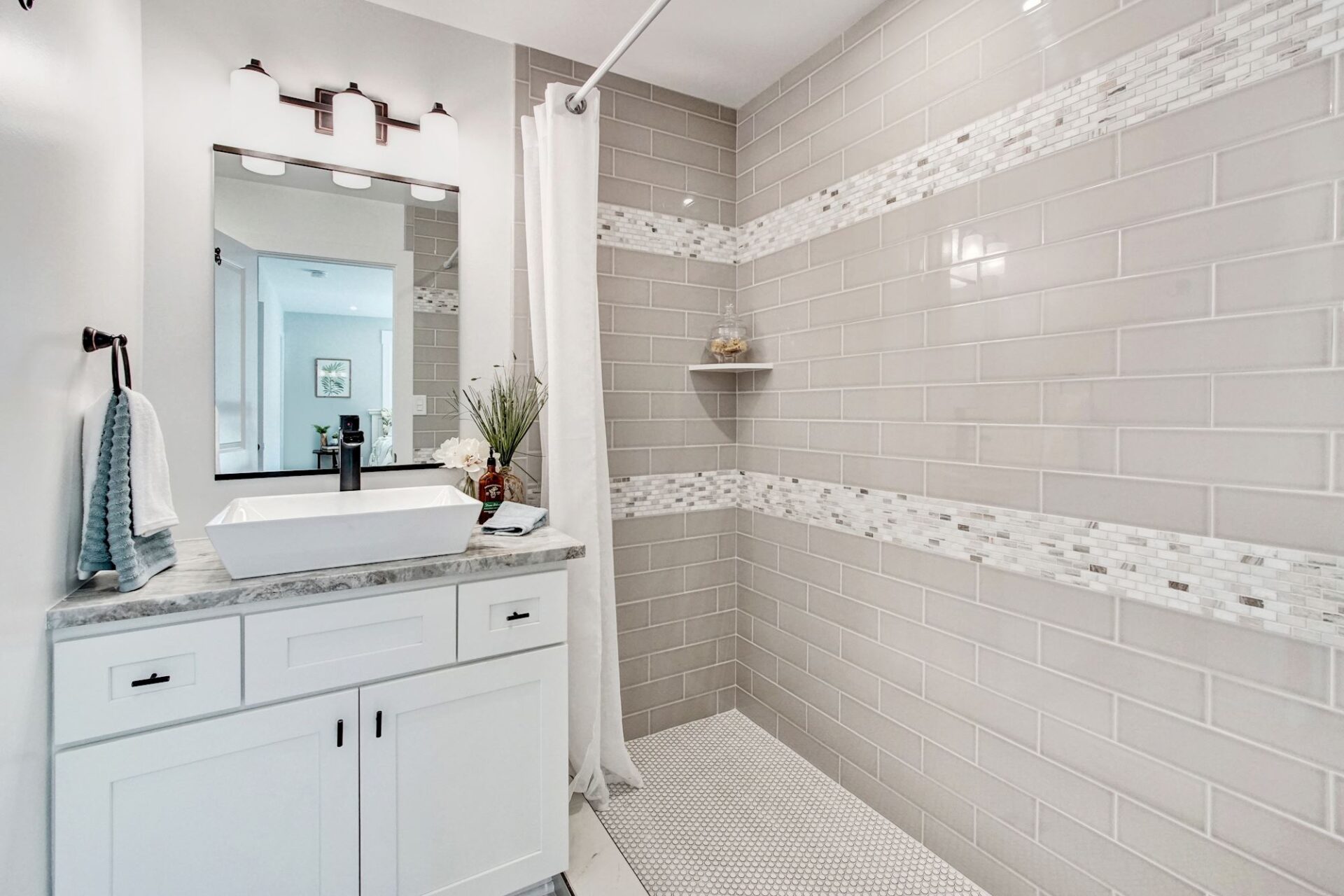 bathroom with shower and sink