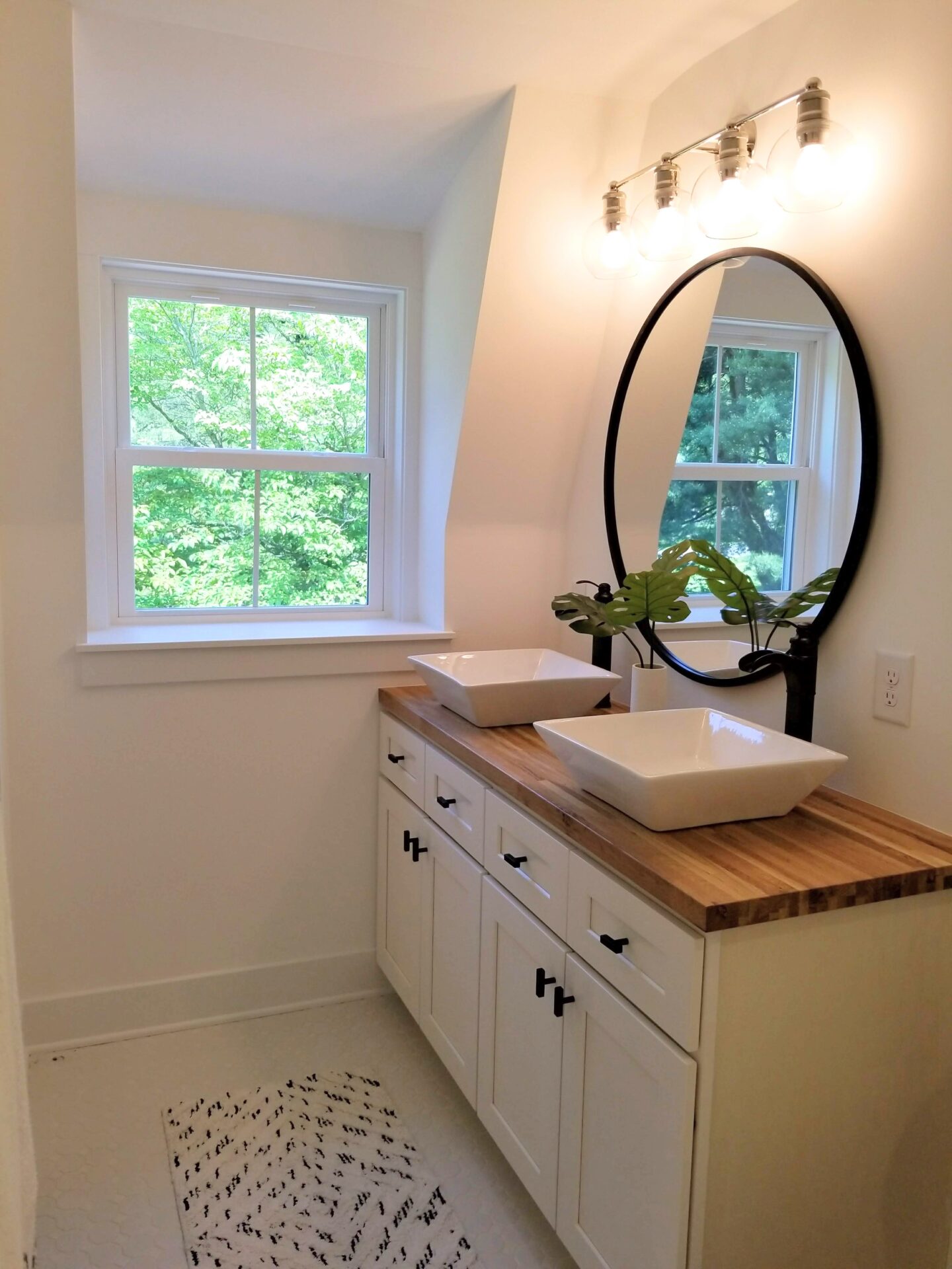 side view of bathroom with mirror