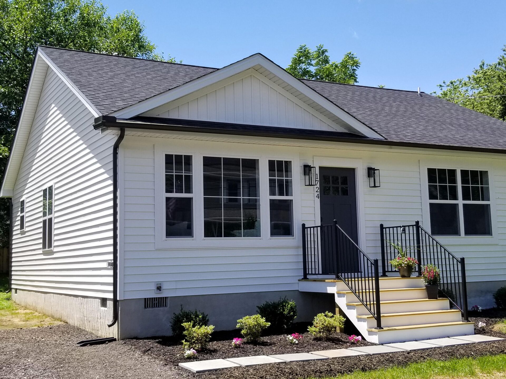 home with a deck and floorboards