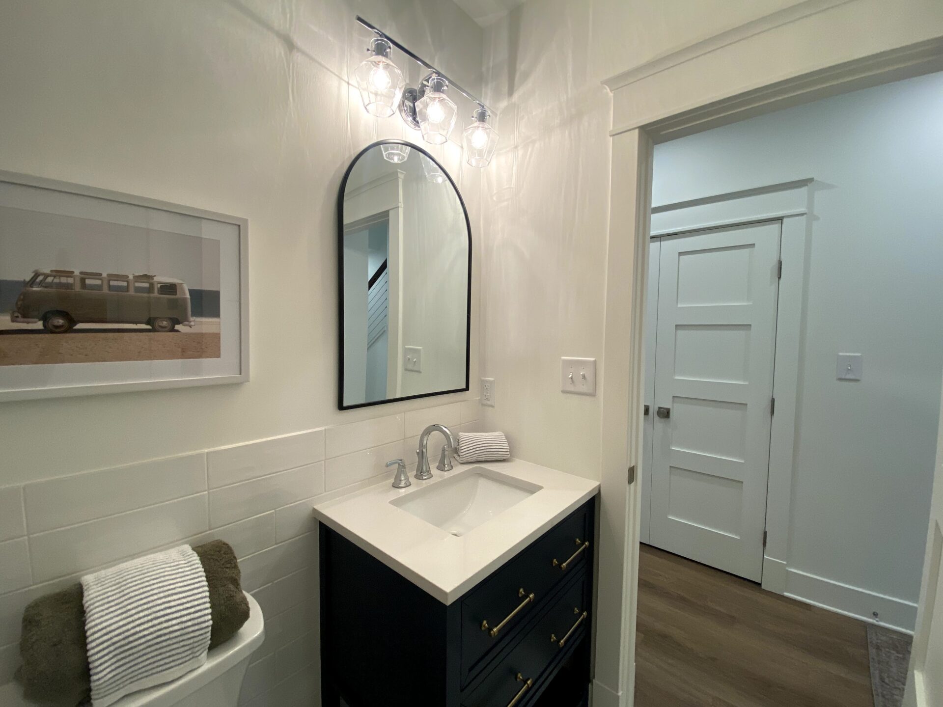 bathroom sink and vanity mirror