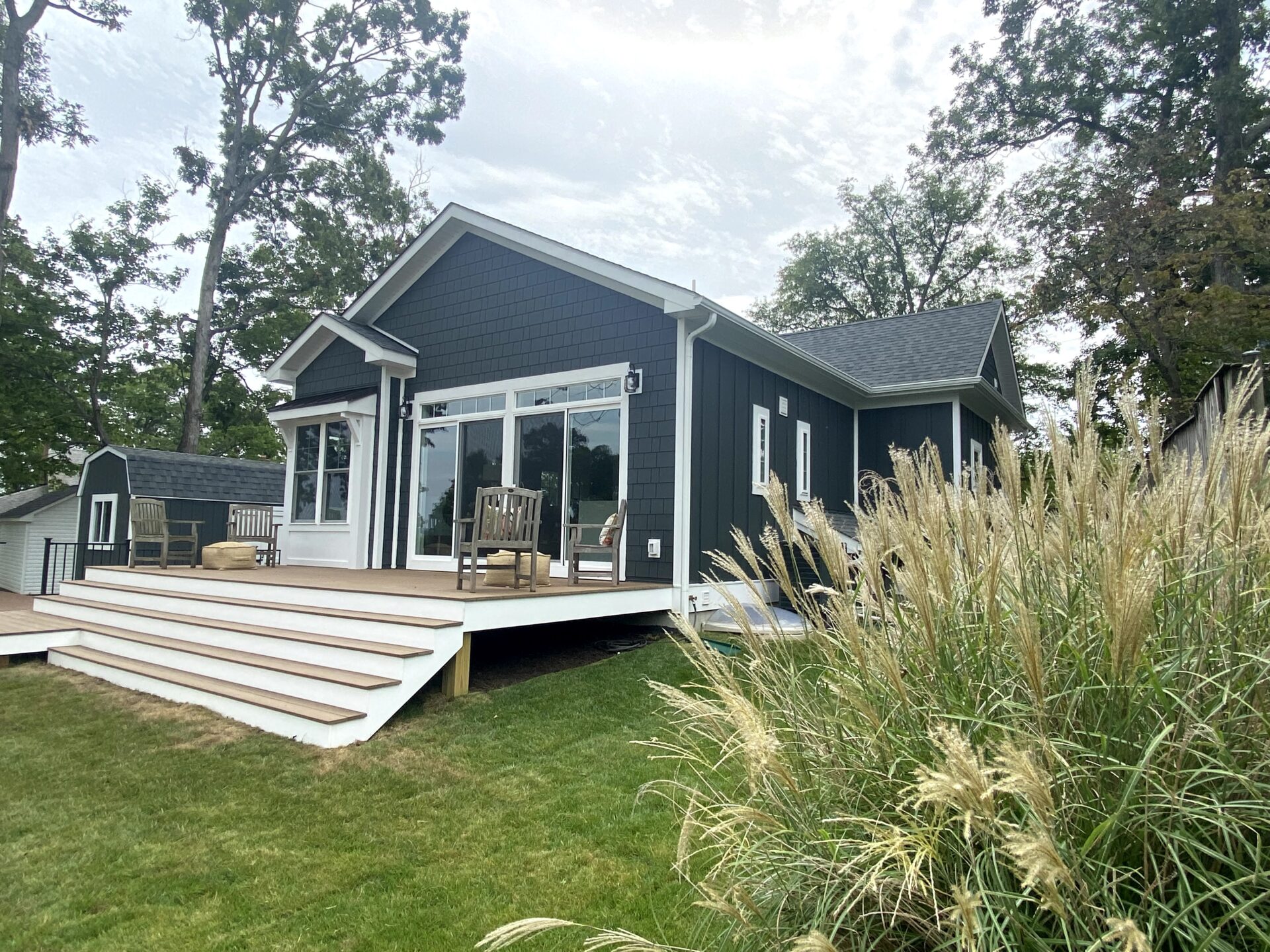 home with a deck and backyard area